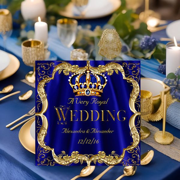 a royal blue and gold wedding table setting