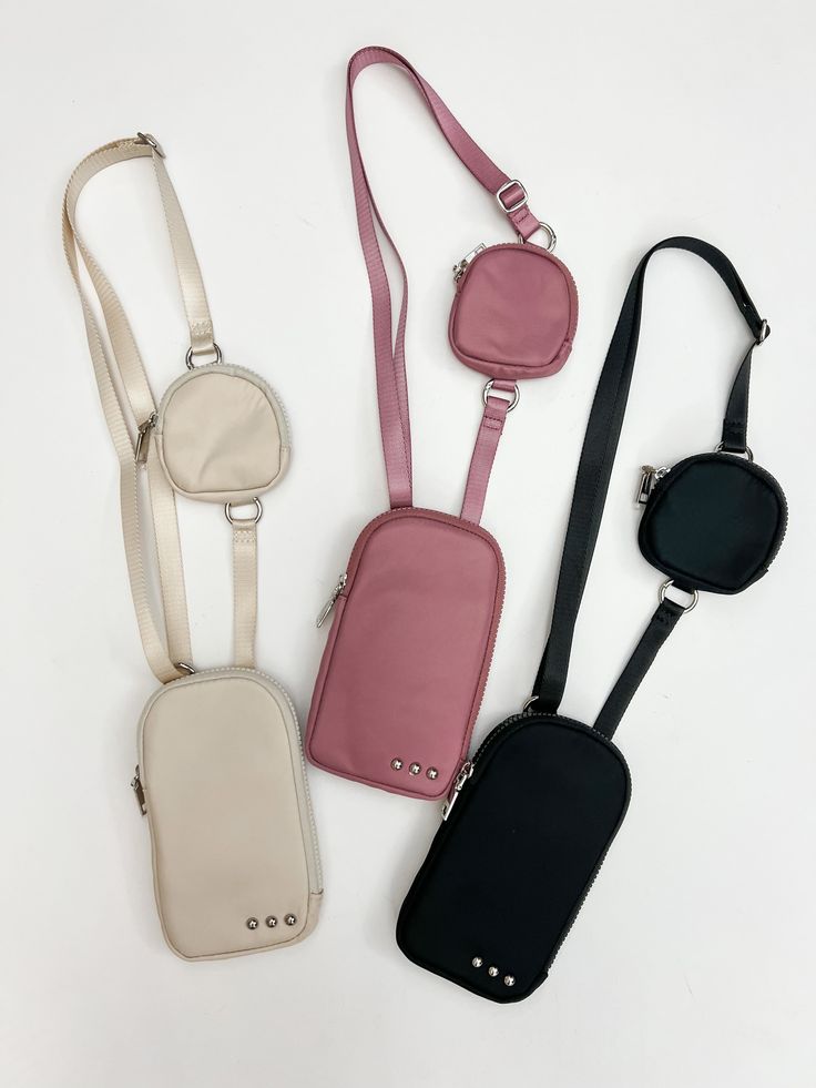 Our Nessa Nylon Crossbody Phone Bag is a must have summer accessory! This bag is apart of our 3 sisters collection, and is the perfect size for sporting events or concerts because it's allowed in most stadiums! This crossbody bag can fit large phones, includes a card holder and mesh pouch in the interior, a pouch on the strap, and is available in 3 colors! Measurements: Bag: 4.5"L x .5" W 8"H Pouch: 3.5"L x 0.75"W x 3.5"H Strap: 32" -50" Materials: Nylon Crossbody Phone Bag, Mesh Pouch, 3 Sisters, Summer Accessories, Nylon Bag, Phone Bag, Sport Event, Crossbody Bag, Card Holder