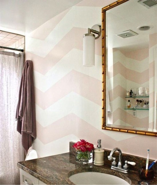 a bathroom with a sink, mirror and shower curtain