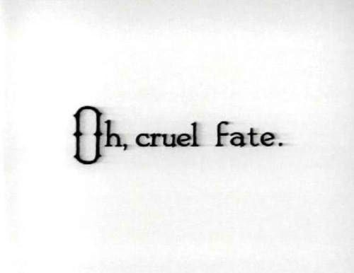 the word h cruel fate written in black ink