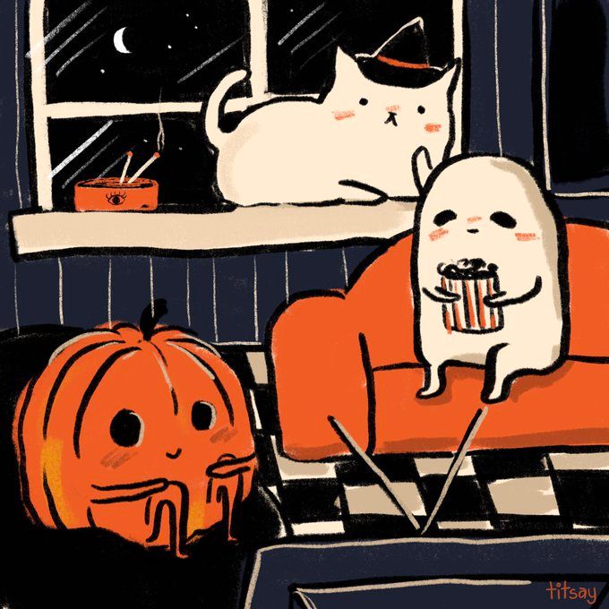 two cats are sitting on the windowsill with pumpkins