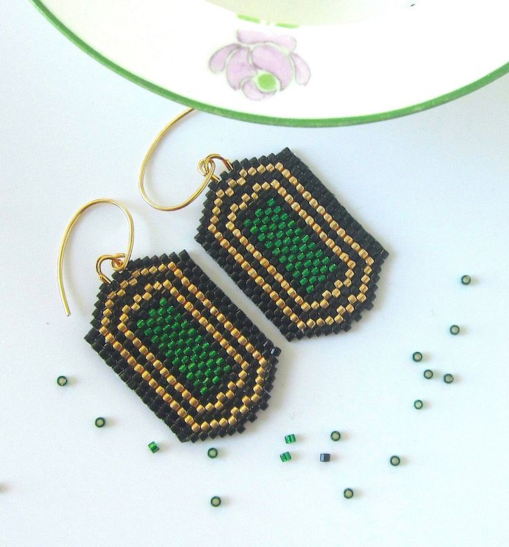 "These Art Deco-inspired earrings will add glamour and class to any occasion.  They are lightweight and they with every move. The 14K gold-filled hooks complete the look of luxury and sophistication. Length: almost 1.5\"  Width:   almost 1\"" Handmade Gold Beaded Earrings For Evening, Rectangular Black Beads Jewelry As Gift, Green Handmade Earrings For Evening, Handmade Formal Dangle Beaded Earrings, Rectangular Black Beaded Jewelry Gift, Elegant Earrings With Gold Beads, Elegant Beaded Drop Earrings With Lever Back, Elegant Gold Beaded Earrings For Gift, Rectangular Black Beads Jewelry Gift