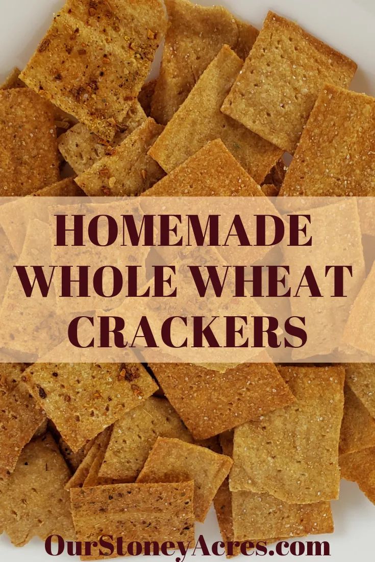 homemade whole wheat crackers on a white plate with the words, homemade whole wheat crackers