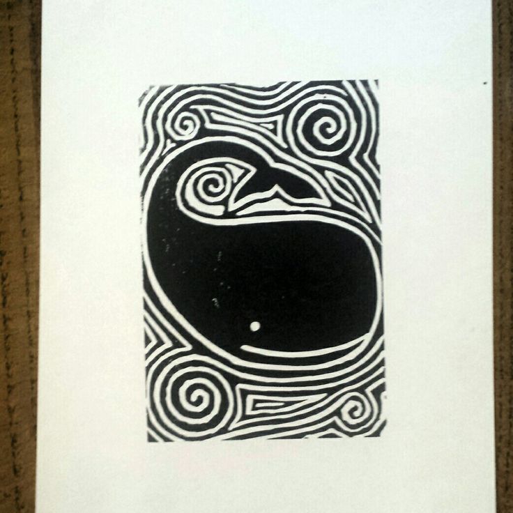 a black and white print with swirls in the shape of a whale's head