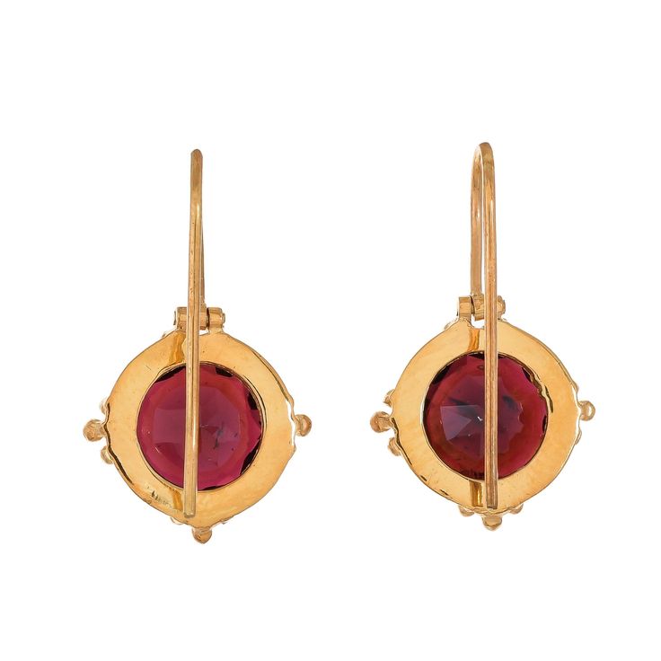 Garnet Vermeil 14K Gold Over Sterling Silver Earring 925 Silver = 4.40 gm. Garnet = 8.10 ct. Garnet is the birthstone for January and is a symbol of friendship. The beautiful earring measures to be 1 inches long including the wire and 0.65 inches wide at its maximum points. The earrings have been made by a team of highly trained and skilled artisans. What is Vermeil 14K Gold? It is a thick layer of 14K Gold plating on 925 Sterling Silver. If for any reason you are not completely satisfied, you m Yellow Gold Sterling Silver Earrings With Bezel Setting, Classic Ruby Birthstone Earrings, 14k Gold Birthstone Earrings For Formal Events, Formal Ruby Birthstone Earrings, Classic Gold Ruby Earrings, Gold Earrings With Round Stone In 14k Gold, Gold Earrings With Ruby Birthstone, Gold Ruby Earrings With Birthstone, Anniversary Brass Earrings With Gemstone