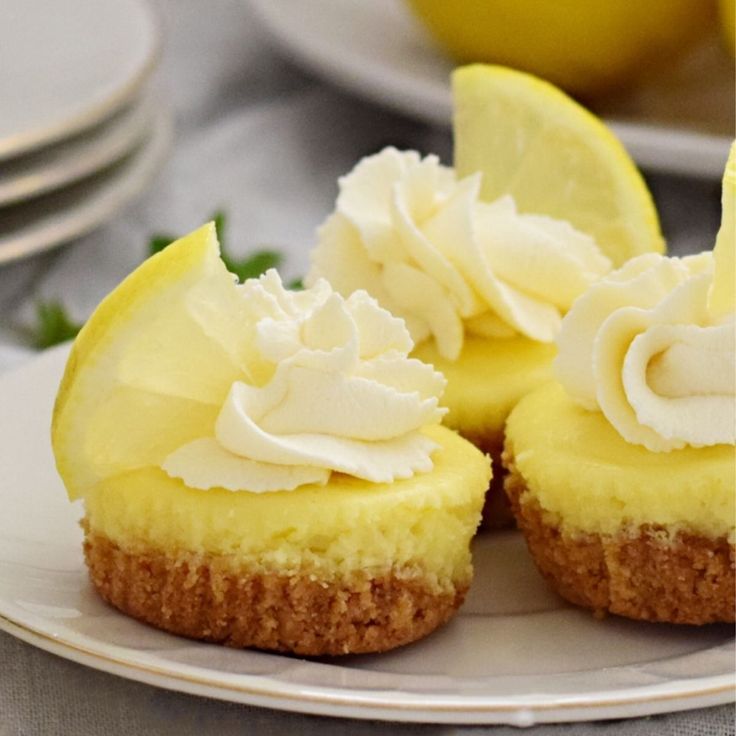 there are two lemon cakes on the plate