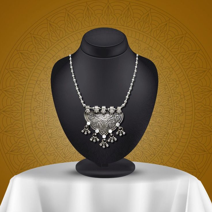 An Indian silver long necklace is a timeless piece of jewellery that can add elegance and sophistication to any outfit. With its intricate design, high-quality 925 silver material, and versatility. An Indian silver long necklace can be worn with a variety of outfits and for different occasions. It can be paired with traditional Indian clothing such as sarees, salwar kameez, or lehenga cholis, or worn as a statement piece with Western clothing such as dresses or blouses. Metal-925 sterling silver Temple Jewelry In Sterling Silver With Oxidized Finish, Bohemian Sterling Silver Jewelry With Silver Chain, Handmade Sterling Silver Temple Necklace For Festive Season, Festive Sterling Silver Pendant Temple Necklace, Festive Sterling Silver Temple Pendant Necklace, Festive Handmade Sterling Silver Temple Necklace, Ceremonial Temple Jewelry In Silver, Elegant Antique Silver Jewelry For Festive Occasion, Antique Silver Elegant Festive Jewelry