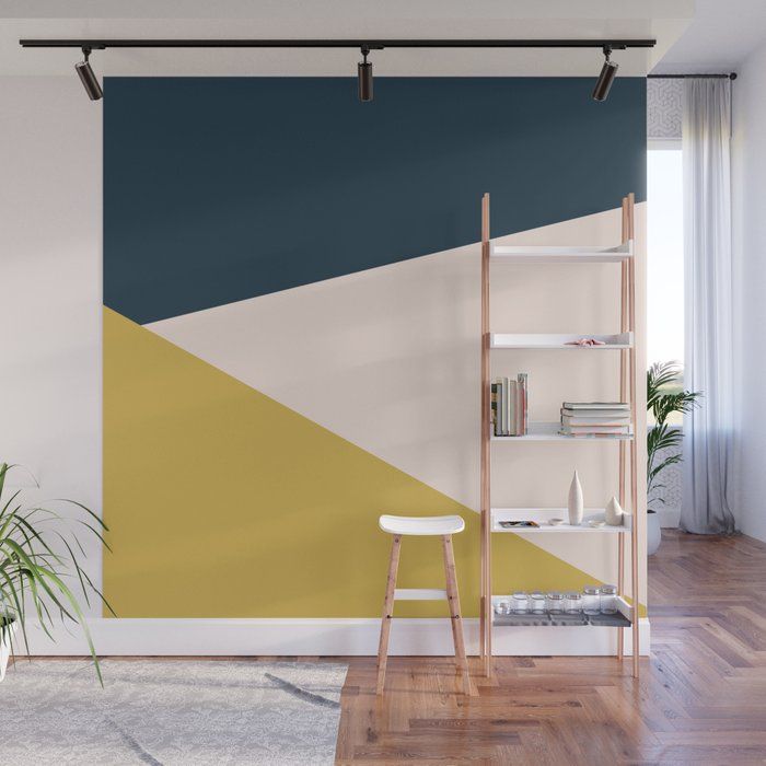 an abstract geometric wall mural in a living room