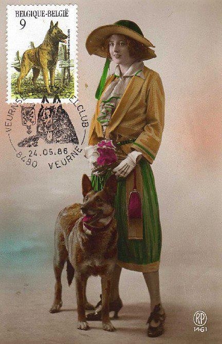 a woman standing next to a dog on top of a postage stamp with an image of a golden retriever