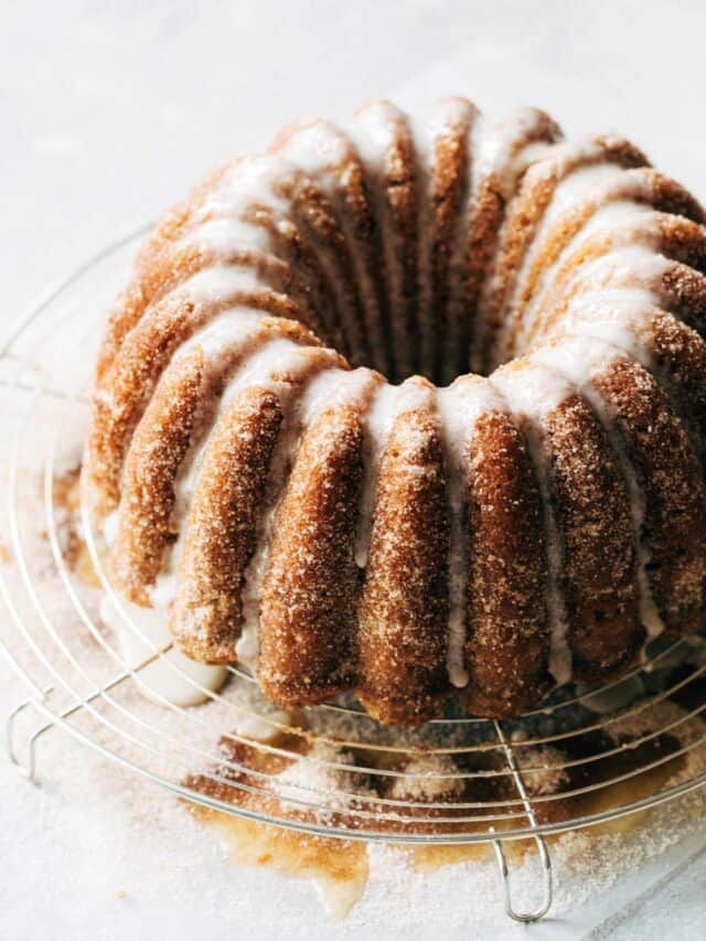 a bundt cake sitting on top of a wire rack