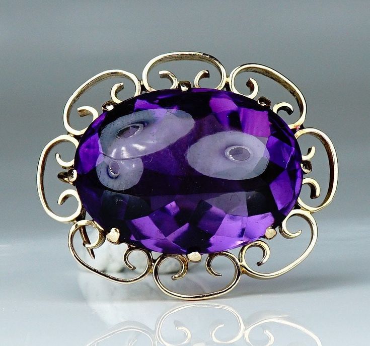 "Stunning Victorian piece of antique 14 carat gold and mixed cabochon top and faceted bottom cut amethyst brooch. Brooch has a open bail for attaching it to a beaded necklace or chain. This item is in excellent condition. No scratches and damage. Secure closure in very good working condition. The brooch is marked with maker mark. Dimension: 33mm (1,29\") by 22mm (0,86\") gem 25mm (0,98\") by 18mm (0,70\") weight 12,2 grams Please let us know if you would like additional photos prior to purchase. Elegant Purple Gemstone Brooches, Elegant Amethyst Brooches For Wedding, Purple Amethyst Gemstone Brooches, Antique Hallmarked Purple Brooches, Antique Purple Hallmarked Brooches, Antique Jeweled Brooches For Formal Occasions, Purple Amethyst Brooches For Wedding, Purple Gemstone Brooches For Weddings, Purple Gemstone Wedding Brooches