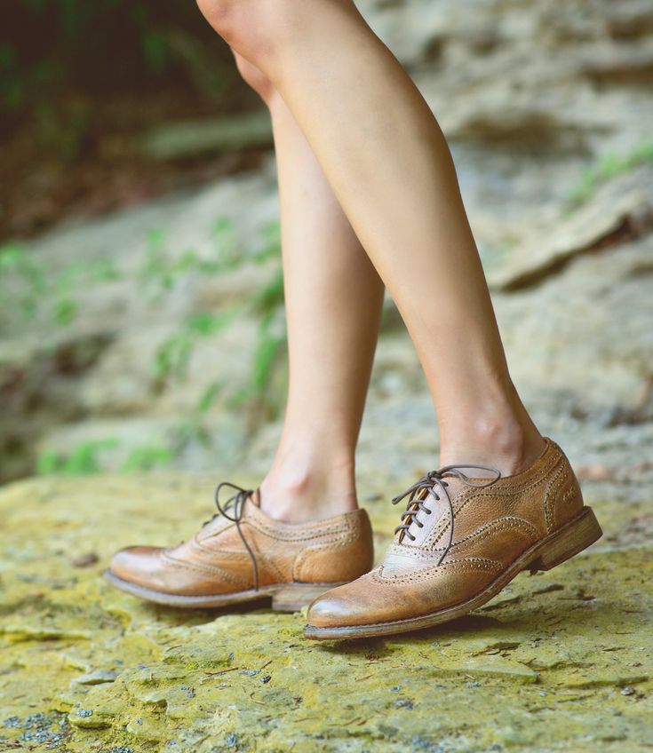 Introduce yourself to a legend, we call her LITA. Each finish is unique like you and is the essential leather flat youve been looking for to add to your office shoe collection. LITA is a refined womens oxford with hints of menswear inspired details including a traditional wingtip, brogue details but all the style and grace you deserve.  Made with high quality  materials that include both sustainable cork and leather midsoles, but also biodegradable toe boxes and heel counters.  Shoes that are bo Classic Wingtip Lace-up Shoes For Fall, Classic Leather Brogue Shoes With Almond Toe, Classic Leather Shoes With Brogue Detailing And Almond Toe, Leather Wingtip Oxfords For Fall, Formal Flat Heel Oxfords With Brogue Detailing, Vintage Oxfords With Brogue Detailing And Flat Heel, Fitted Leather Wingtip Shoes With Rubber Sole, Fall Wingtip Lace-up Shoes With Leather Sole, Vintage Leather Shoes With Brogue Detailing And Flat Heel