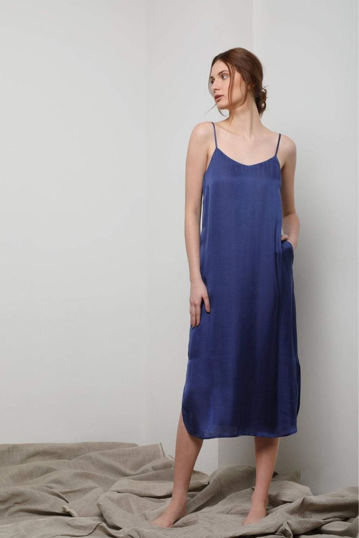 Simple meets elegant - it’s no wonder we named it the Easy Slip Dress. Designed with a relaxed fit, this silhouette has a scoop neck detail with hidden side pockets at hips. We love to wear ours layered underneath jackets and sweaters or wear just for lounging. French seam details mean that all raw edges are hidden in an elegant finished seam. Casual Loungewear Dress With Adjustable Straps, Relaxed Fit Spaghetti Strap Dresses For Spring, Casual Dresses With Spaghetti Straps And Relaxed Fit, Casual Spaghetti Strap Loungewear Dress, Casual Relaxed Fit Dress With Spaghetti Straps, Casual Spaghetti Strap Dresses With Relaxed Fit, Chic Spring Sleep Midi Dress, Chic Midi Dress With Spaghetti Straps For Loungewear, Casual Slip Dress With Spaghetti Straps For Loungewear