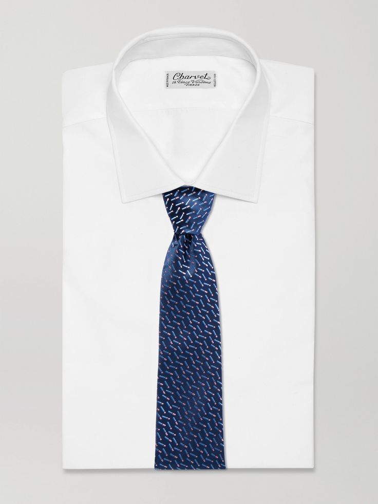 Charvet is known for luxury suiting, having been a trusted favourite among gentlemen from 1838 to the present day. This tie is made from lustrous silk jacquard-woven with a 'matchstick' pattern that adds a playful finishing touch. Luxury Standard Tie For Formal Occasions, Luxury Blue Ties For Business, Timeless Blue Suit And Tie Accessories For Formal Occasions, Luxury Ties For Office Suit Accessories, Tailored Blue Formal Tie, Luxury Blue Suit And Tie Accessories For Semi-formal Occasions, Elegant Blue Silk Suit, Classic Formal Suits With Ties, Elegant Business Suits