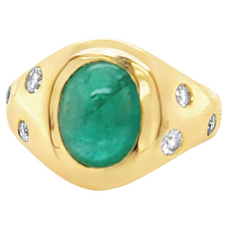 Beautiful Oval Cabochon Emerald & Diamond Cocktail Ring features a 3.42 carats Natural Beryl Oval Vivid Green Zambian Cabochon Emerald with 7 Round Brilliant shape Diamonds set in 18k Yellow Gold. Total diamond weight is 0.39 carats. Ring size is 6 . Ring weighs 10.33 grams. 18k Yellow Gold. Ring Size: 6 Metal: 18K gold Primary Stone: Emerald Stone Cut: Cabochon Weight: 3.42 carats Lab Report :GFCO Origin : Zambia Side Stones : Natural Diamonds Weight : 0.39 carats Cutting: Round Brilliant Color Lab Report, Diamond Cocktail Ring, Emerald Diamond Ring, Diamond Cocktail Rings, 18k Yellow Gold Ring, Emerald Stone, Pink Ring, Yellow Gold Ring, Stone Cuts