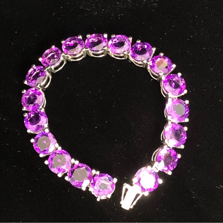 Large Round 10mm Amethysts 52.00ctw Set In Sterling Silver With Clasp. Length: 7” Jfm625 Formal Amethyst Round Bracelets, Formal Round Amethyst Bracelets, Formal Amethyst Bracelets, Sterling Silver Amethyst Bracelet For Formal Occasions, Elegant Silver Tennis Bracelet With Amethyst, Formal Sterling Silver Amethyst Bracelet, Formal Amethyst Gemstone Tennis Bracelet, Elegant Silver Amethyst Tennis Bracelet, Elegant Silver Tennis Bracelet