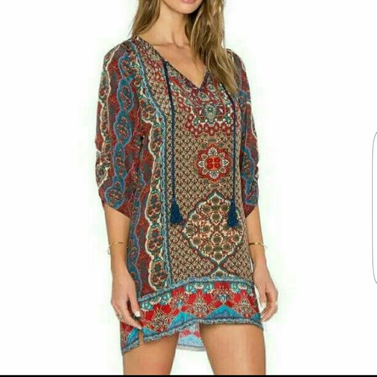 Price Firm Time To Get 'Festival' Ready With This Awesome Hippie Boho Chic Ethnic Mini Dress With 3/4 Sleeves And Tassel At Neckline. Measured Laying Flat Small Bust 18.5" Length 32" Large Bust 20.5" Length 32" 87% Cotton, 13% Acetate Has A Satiny Feel. No Stretch. Red V-neck Boho Hippie Dress, Printed Bohemian Tunic Boho Dress, Multicolor Bohemian Boho Dress With Paisley Print, Bohemian V-neck Mini Dress With Vibrant Print, Multicolor Bohemian Dress With Paisley Print, Bohemian Mini Dress With Vibrant Print, Bohemian Mini Dress With Colorful Pattern, Bohemian Mini Dress With Vibrant Print For Beach, Casual Printed Boho Dress For Festival