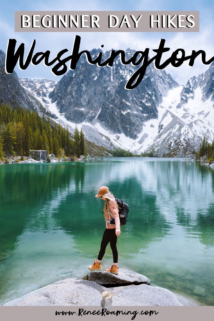 a woman standing on top of a rock in front of a mountain lake with the words, beginer day hikes washington