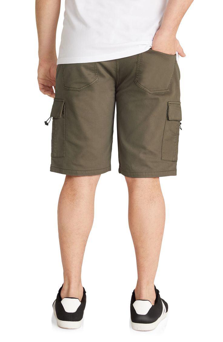 An elastic waist and stretch-cotton fabric modernize these classic cargo shorts outfitted with front slant pockets and side cargo pockets. 11" inseam; 21 1/2" leg opening; 11 1/4" front rise (size 36)   Elastic/drawstring waist   98% cotton, 2% elastane   Machine wash, line dry   Imported Khaki Knee-length Shorts With Side Pockets, Utility Cargo Style Knee-length Shorts, Utility Cargo Knee-length Shorts, Utility Cargo Shorts With Multiple Pockets, Utility Knee-length Cargo Shorts, Bermuda Utility Cargo Shorts, Knee-length Utility Cargo Bottoms, Utility Cargo Style Bermuda Shorts, Utility Cargo Bermuda Shorts