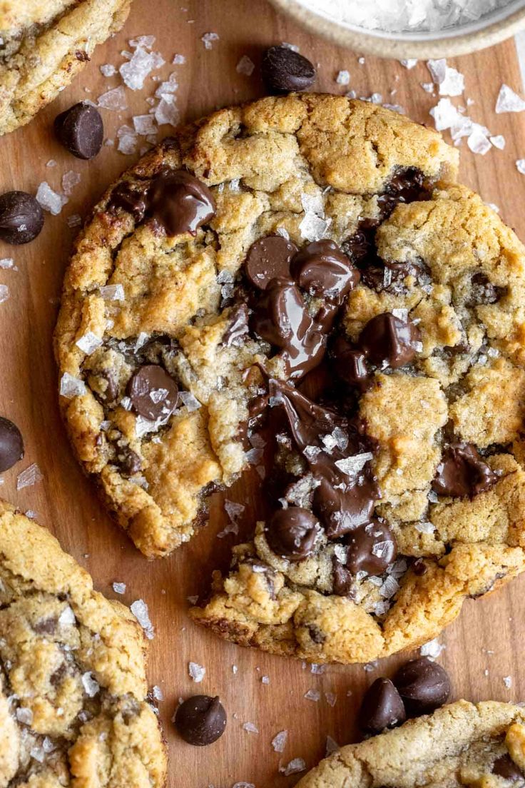 chocolate chip cookies on a wooden cutting board