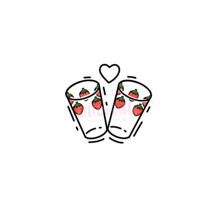 two strawberries in cups with hearts on them