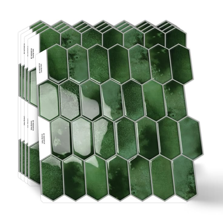 the green hexagonal tiles are arranged on top of each other