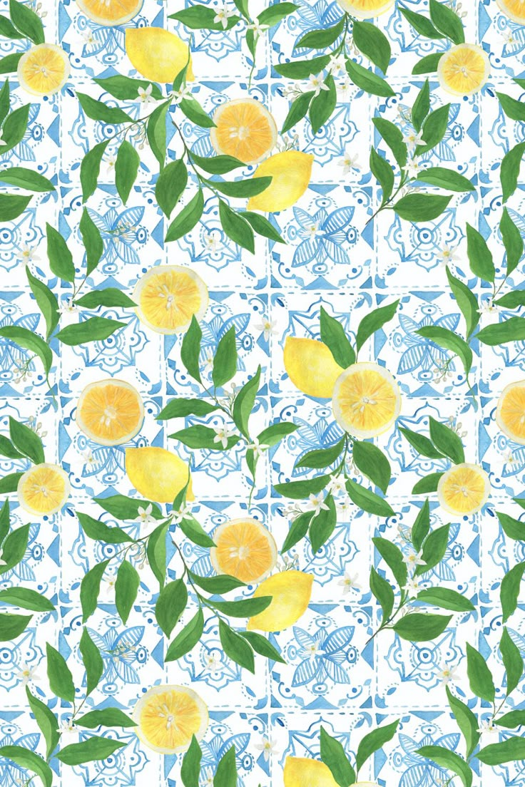 a blue and white tile with lemons on it