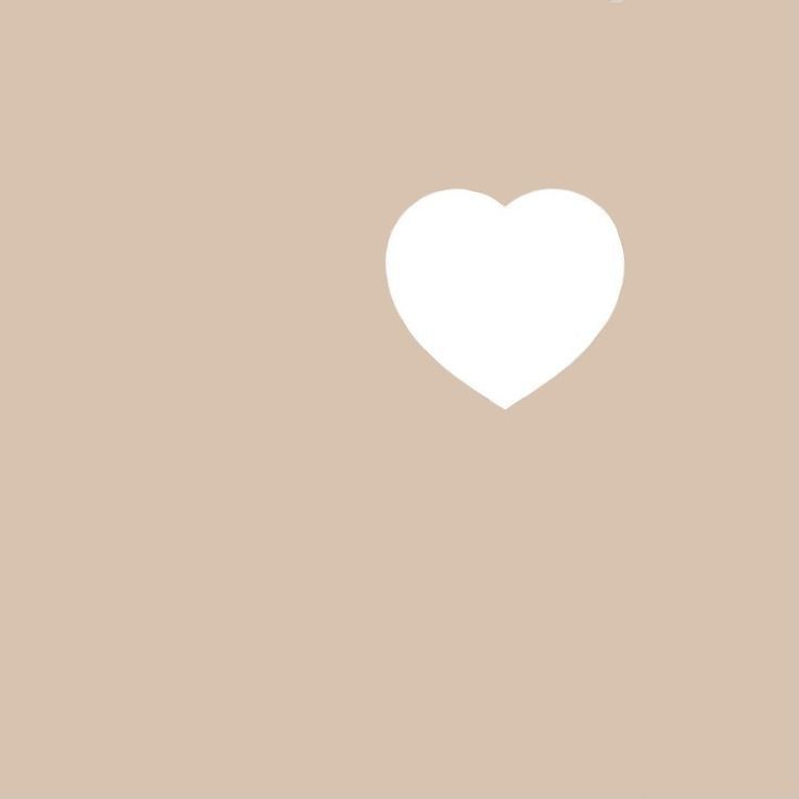 a white heart on a beige background