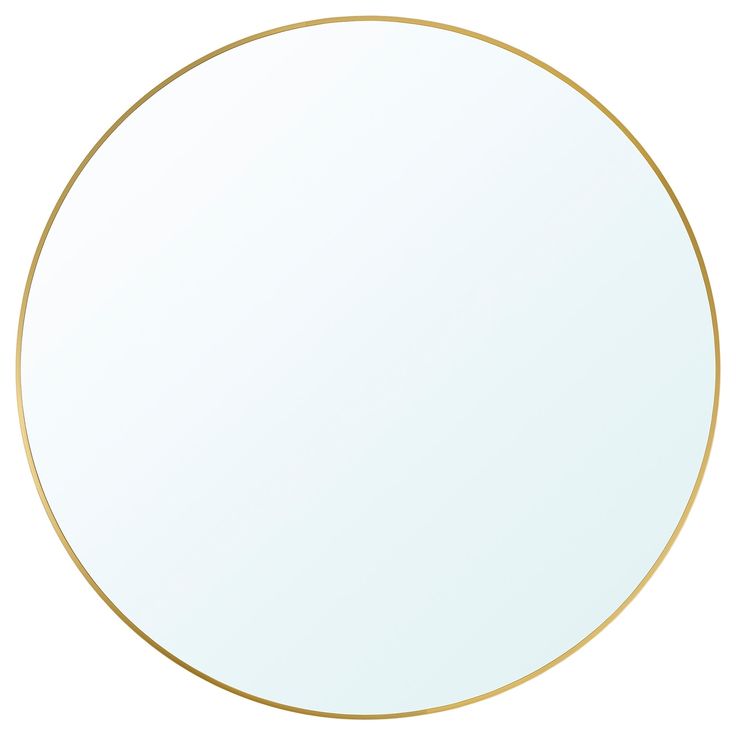 a round mirror with a gold rim on a white background