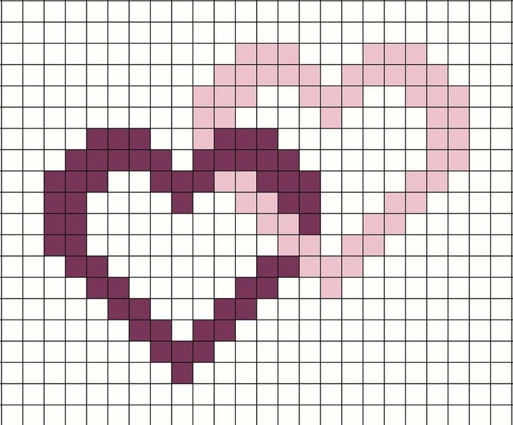 a cross stitch heart pattern with pink and white squares in the shape of a heart