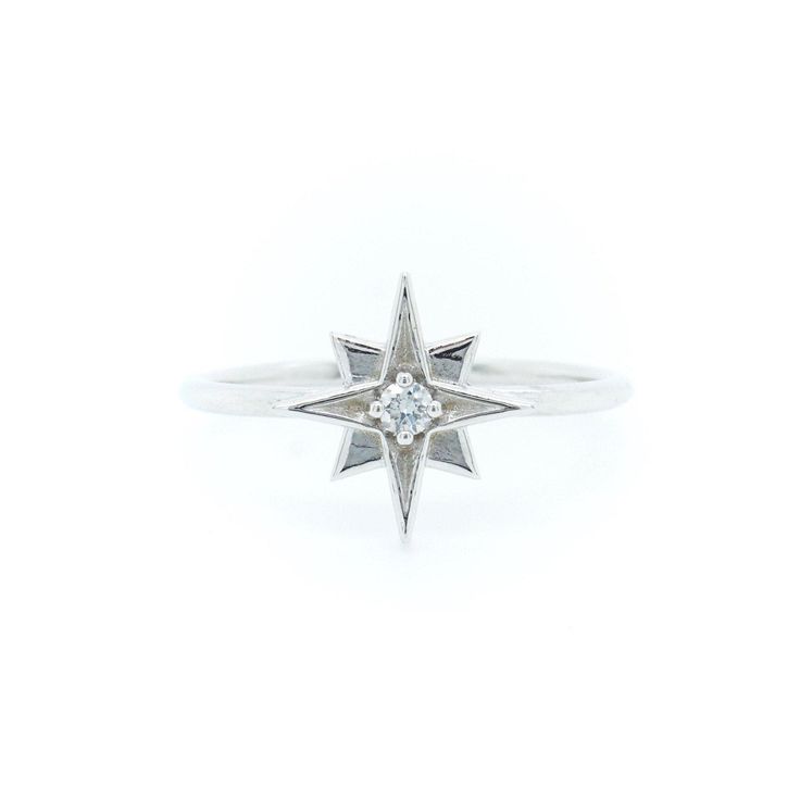 Twinkle, twinkle dainty diamond Star. A celestial diamond star ring made with recycled 14k solid gold. Choose between a dark diamond or a white diamond to sparkle within the cute star. Gorgeous little ring to wear on the daily. natural earth-mined Diamonds round brilliant cut - .02ct conflict-free Recycled 14k white, rose or yellow Gold Made to Order - Production time 2-3 weeks :: select diamond color - Salt & Pepper Diamond or White Diamond :: select gold color - 14k yellow, rose or white g Celestial Style Single Diamond Ring, Celestial White Gold Diamond Ring, Star-shaped Diamond Ring With Single Diamond For Anniversary, Celestial Style White Gold Diamond Promise Ring, Celestial Star-shaped Diamond Ring With Single Cut Diamonds, Celestial Single Diamond Ring Gift, Celestial Single Diamond Promise Ring, Celestial Style Single Diamond Ring As Gift, Celestial Style Single Diamond Promise Ring