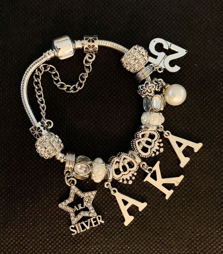 Silver Star Charm Bracelet Aka Silver Star, Silver Star Bracelet, Star Charm Bracelet, Aka Sorority, Pandora Style, Star Bracelet, Pearl Charms, Charm Set, Photo Bracelet