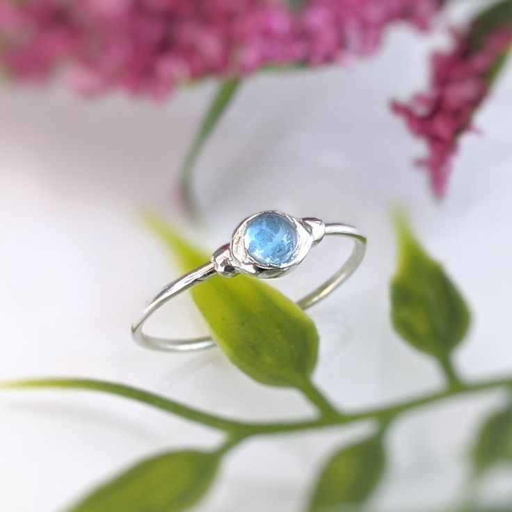 Dainty Blue Topaz stacking ring - Moondrop Creations Minimalist Topaz Gemstone Ring For Everyday Wear, Minimalist Topaz Ring For Everyday, Dainty Topaz Birthstone Promise Ring, Dainty Blue Topaz Promise Ring, Dainty Solitaire Topaz Ring, Dainty Blue Topaz Birthstone Ring, Minimalist Blue Topaz Birthstone Ring Gift, Stackable Blue Topaz Birthstone Ring, Stackable Blue Topaz Ring For Promise