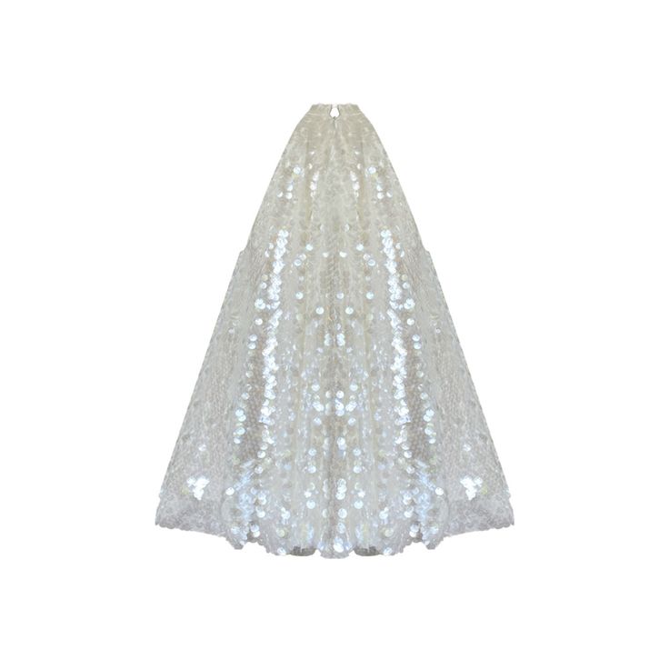 a white dress with sequins on it