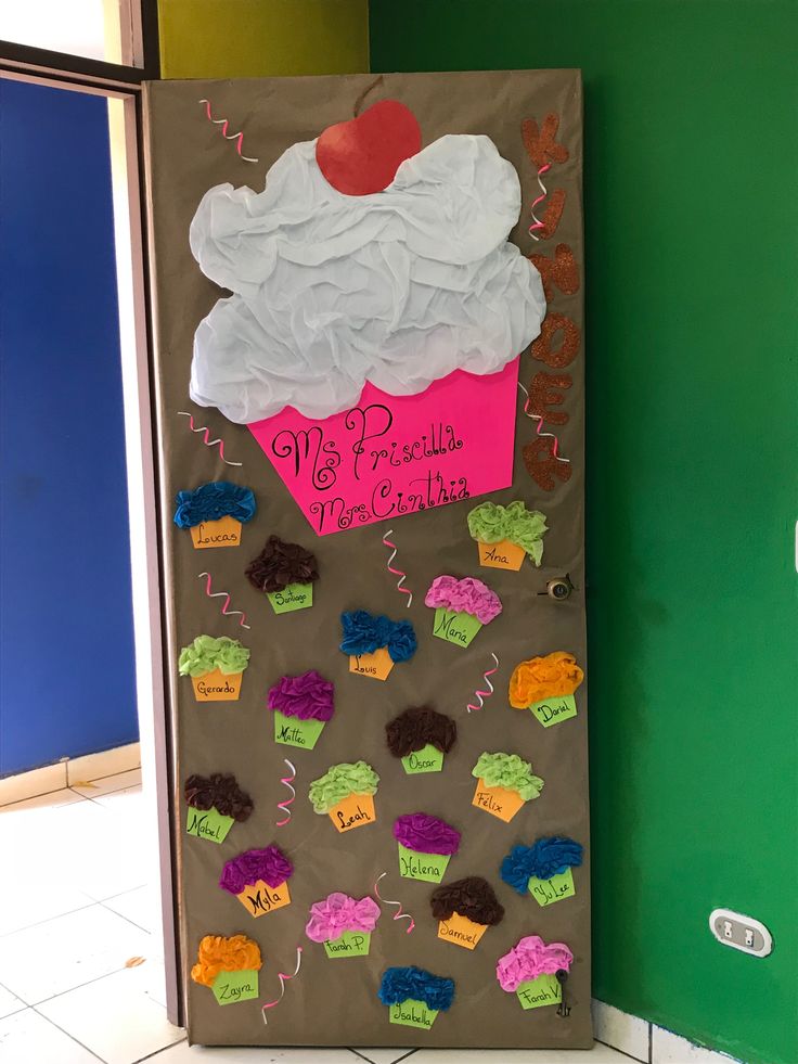 a bulletin board decorated with cupcakes and confetti for teachers to decorate