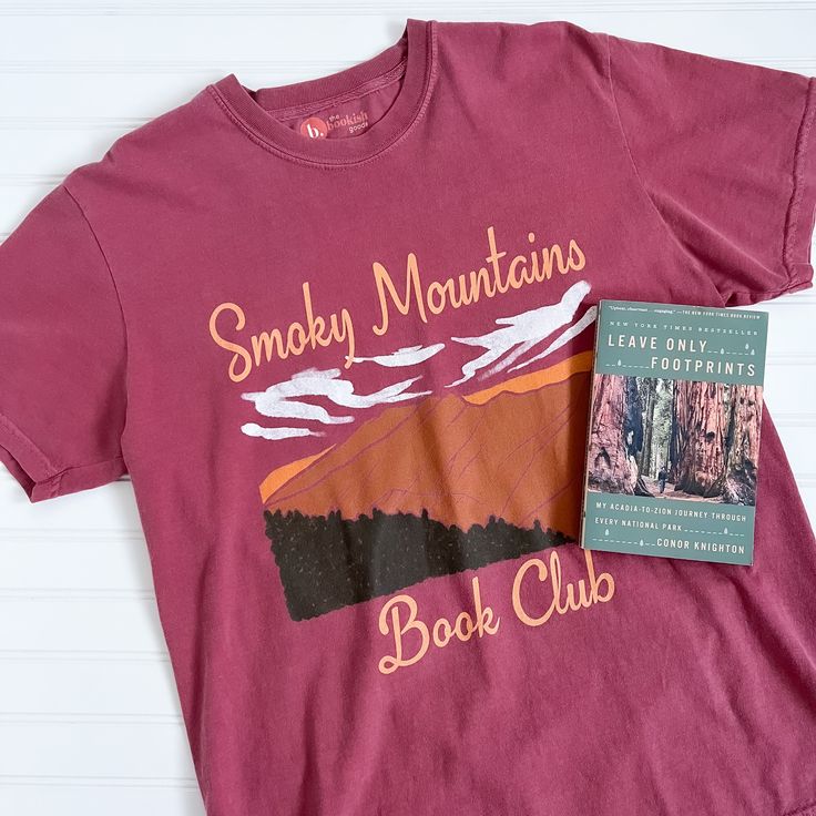 Let's go on an adventure to the National Parks! This bookish tee features an oversized design of the Smoky Mountains on a brick red Comfort Colors tee. It's so comfy, high quality & made to last with a soft, vintage look and feel! You will not want to take it off. Features 100% ring spun cotton Soft washed garment dyed fabric Tee runs slightly big and has a wide boxy throw-back 90s style cut For size guide, view comfort colors tee Pictured: I'm 5'5" & wearing a size large. Casual Red T-shirt For Outdoor Activities, Comfort Colors Tee, 90s Style, Brick Red, Smoky Mountains, Dyed Fabric, Vintage Look, Go On, Sweater Vest