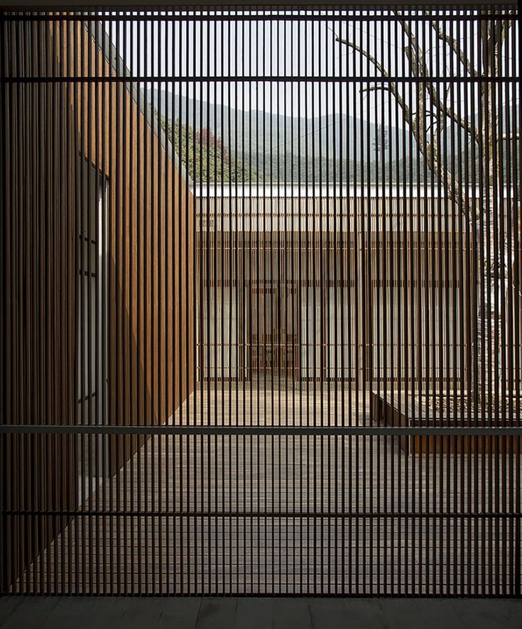 the inside of a jail cell with bars on it