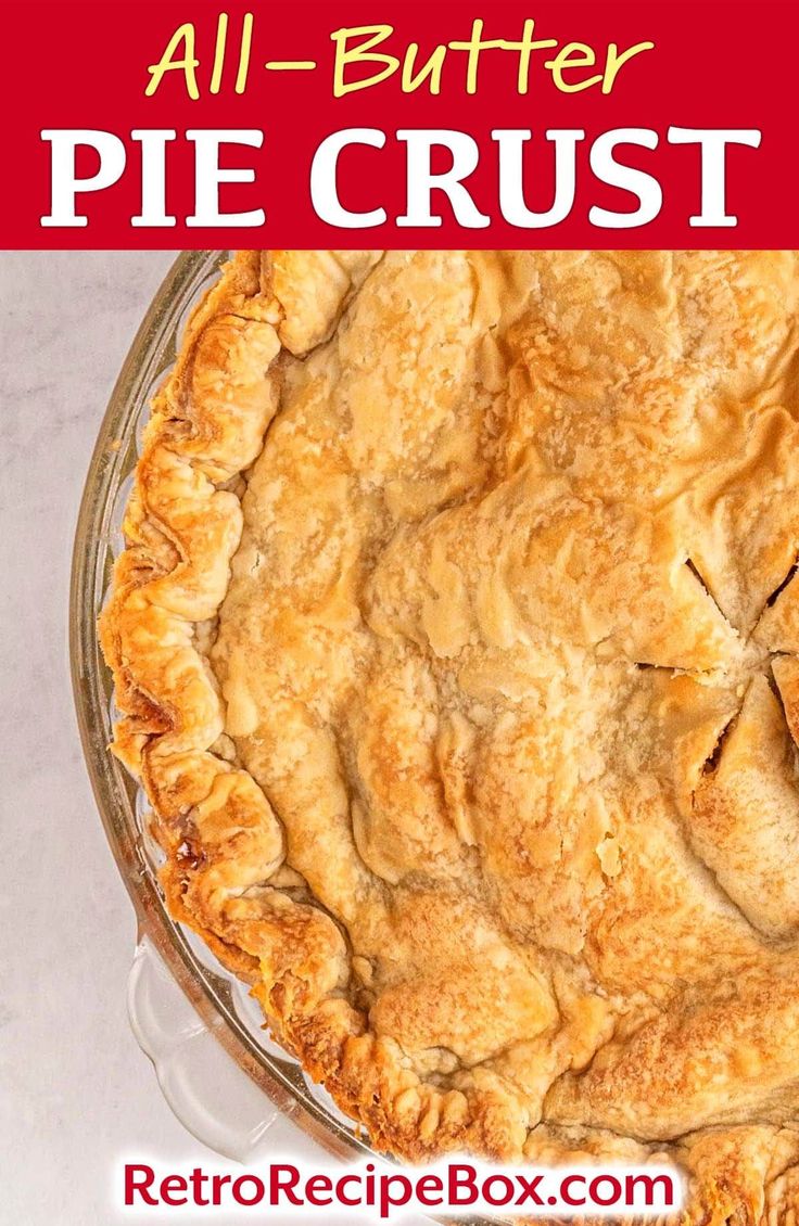 an all butter pie crust in a glass pie plate on a white table with text overlay