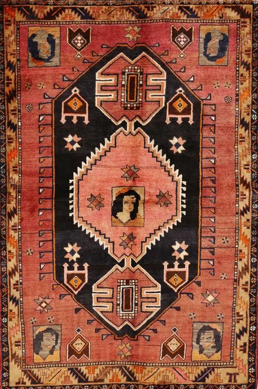 an old rug with many different colors and patterns