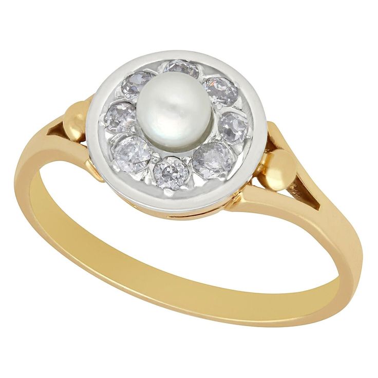 A fine and impressive antique pearl and 0.36 carat diamond, 18 karat yellow gold and 18 karat white gold set dress ring; part of our antique jewelry and estate jewelry collections. This fine and impressive antique diamond and pearl ring has been crafted in 14k yellow gold with a 14k white gold setting. The pierced decorated circular mount displays a central feature 4.5mm pearl set in relief, encircled by eight, well color matched, bead set Old European round cut diamonds. The central cluster is Diamond And Pearl Ring, Yellow Gold Dress, Yellow Gold Cocktail Ring, Pearl And Diamond Ring, White Gold Set, Gold Cocktail Ring, Gold Cocktail, Ring Antique, Pearl Set