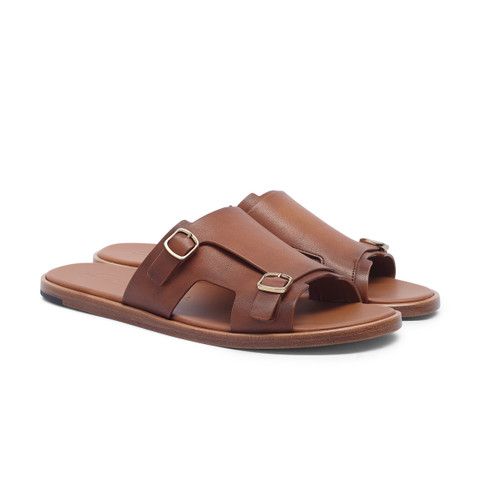 Summer Leather Slides With Gold Buckle, Brown Open Toe Sandals With Gold Buckle, Classic Sandals With Brass Buckle For Summer, Luxury Leather Footbed Sandals With Tang Buckle, Summer Open Toe Slides With Brass Buckle, Double Strap Leather Footbed Sandals, Leather Open Toe Slides With Brass Buckle, Leather Slides With Brass Buckle For Summer, Leather Open Toe Slides With Gold Buckle