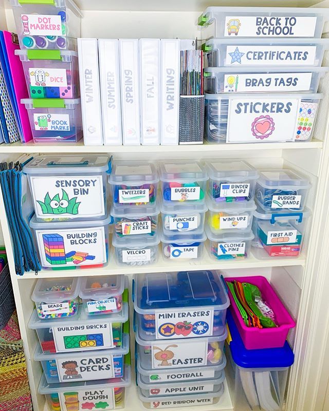 a book shelf filled with lots of books and plastic containers