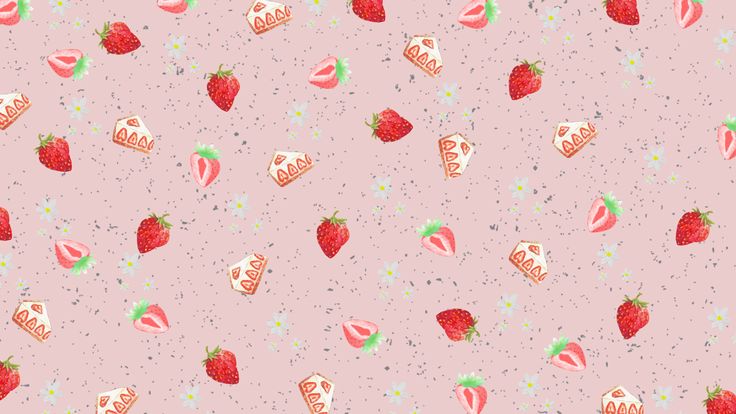 strawberries and strawberry slices on a pink background