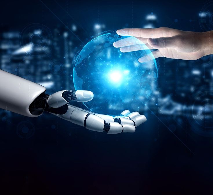 two hands reaching out towards each other to touch a robot's hand, with city lights in the background