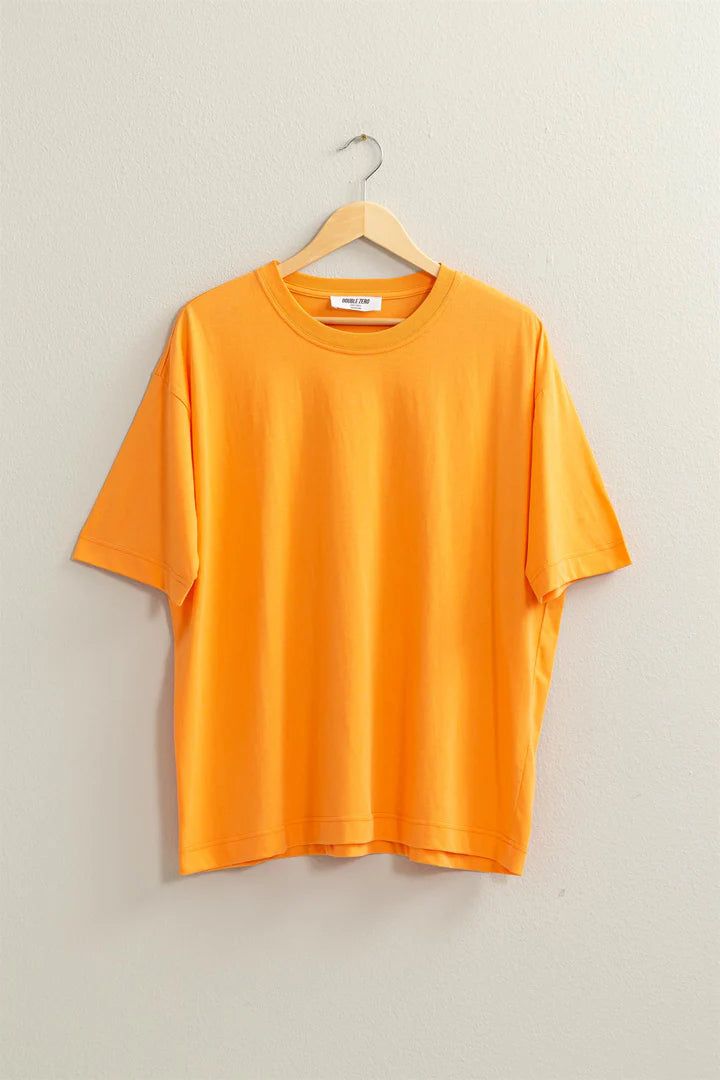 Experience style and comfort with our Violet Oversized T-Shirt! Made with a soft off-white fabric, this shirt features a fashionable oversized fit and a beautiful Orange color. Perfect for any occasion, this shirt will elevate your wardrobe and make you feel confident and stylish. Oversized Orange Summer T-shirt, Oversized Solid Color T-shirt For Summer, Oversized Solid Color Graphic Tee, Oversized Basic Solid Color T-shirt, Spring Basic Drop Shoulder T-shirt, Oversized Solid Color T-shirt For Everyday, Oversized Orange Casual Tops, Oversized Orange T-shirt For Summer, Cotton Solid Color T-shirt For Loungewear