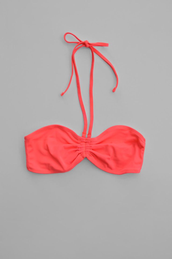 A vintage (circa 2003) Topshop bandeau halter bikini top in neon pink coral. This retro bikini top has removable halter neck straps and flexible boning encased at the side seams for extra support. Please note that the center front ruching detail is fixed with encased elastic (not adjustable but it does stretch). The piece is in good condition with light discoloration (pale purple / blueish marks) at the neck ties and center front. Details: Vintage clothing item Topshop Neon pink coral Size US 4 Bra Hooks, Pale Purple, Neck Ties, Pink Coral, Neck Strap, Swim Wear, Swimwear Tops, Individual Style, Halter Neck