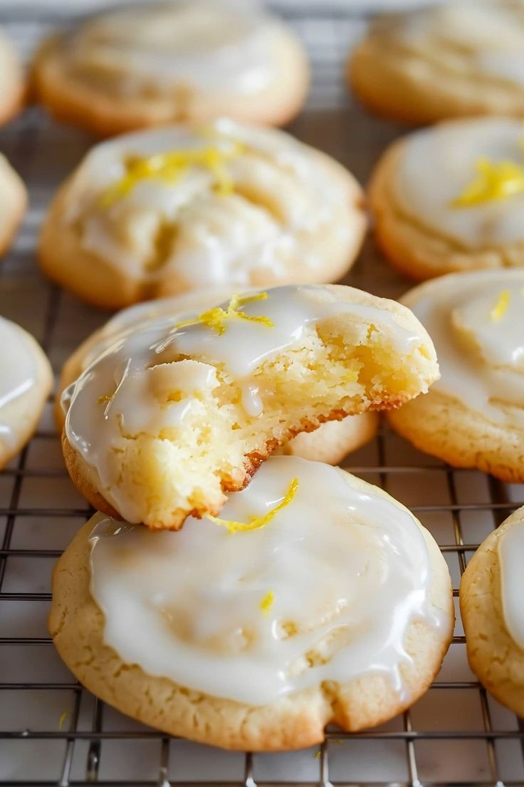 iced lemon cookies with icing on a cooling rack, ready to be baked or eaten