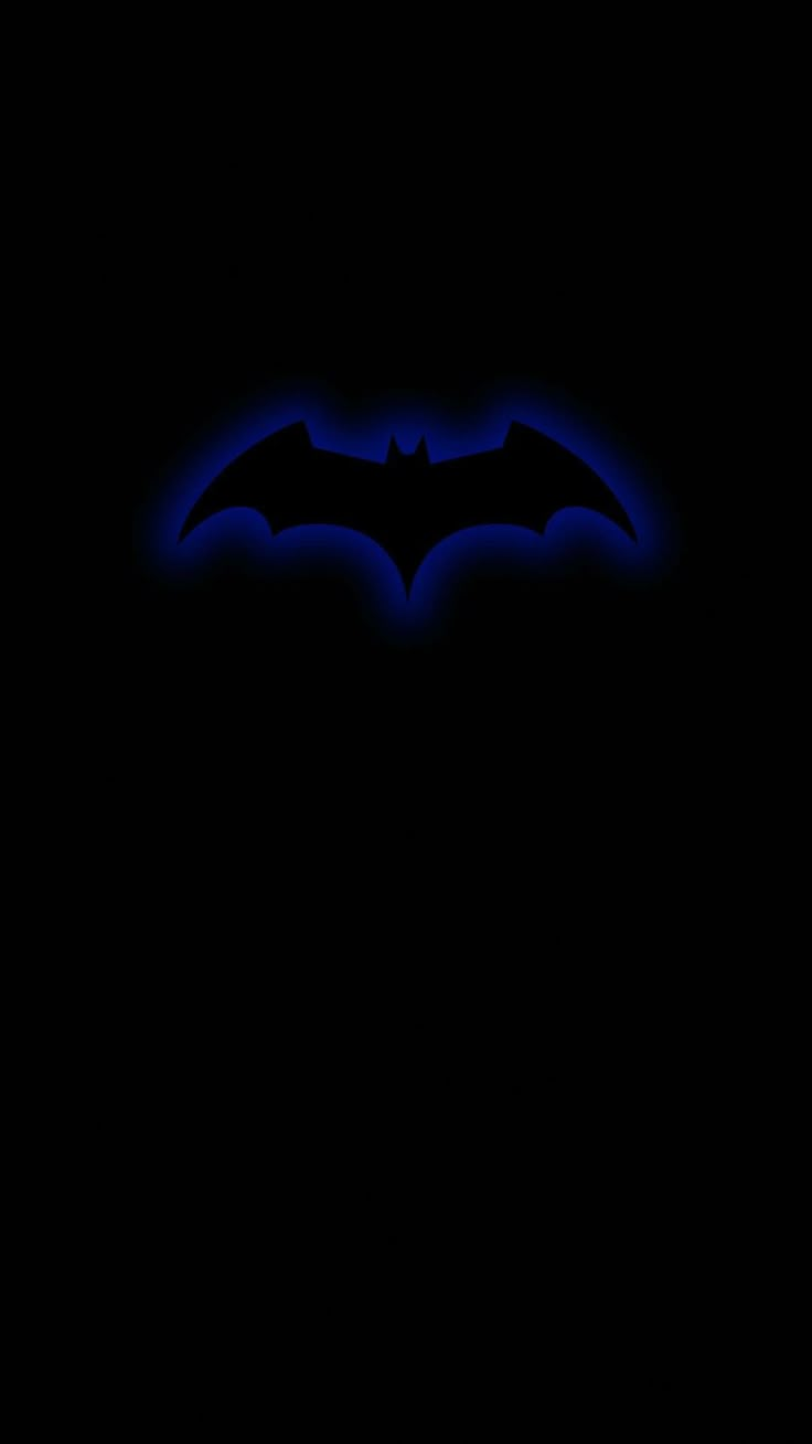 the dark knight logo is lit up in blue on a black background, with only one bat visible