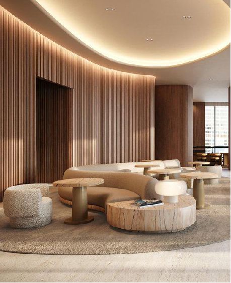 a living room filled with lots of furniture next to a wall covered in wooden slats