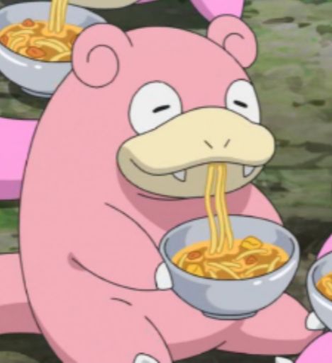 a pink bear eating noodles from a bowl